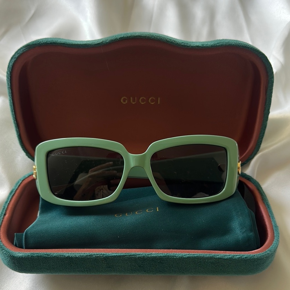 Gucci green sunglasses. New with tags!